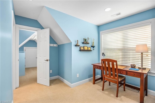 office featuring visible vents, baseboards, and light colored carpet