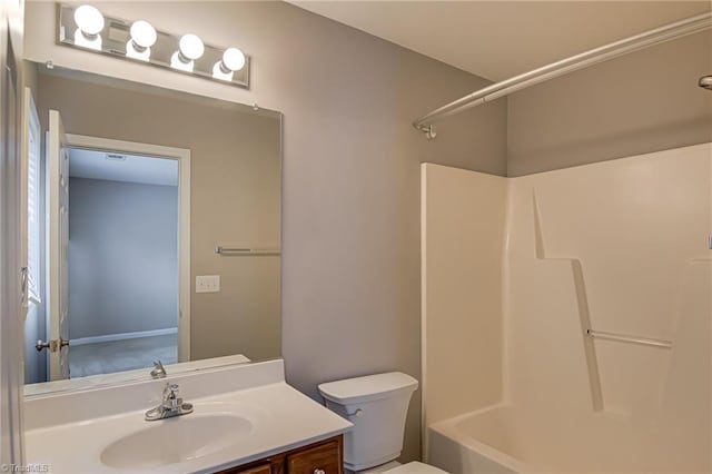full bathroom featuring toilet, shower / bath combination, and vanity
