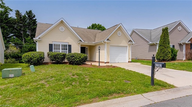 ranch-style house with a garage, driveway, and a front lawn
