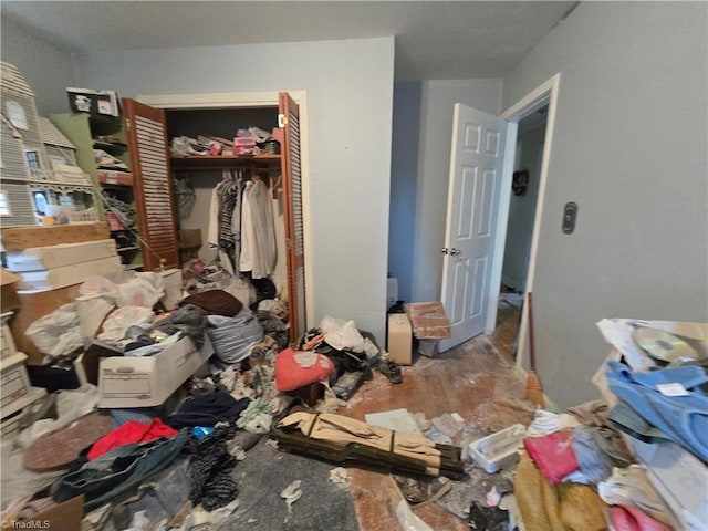 bedroom with a closet and wood finished floors