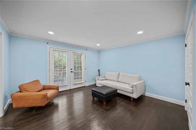 sitting room with french doors, baseboards, and ornamental molding