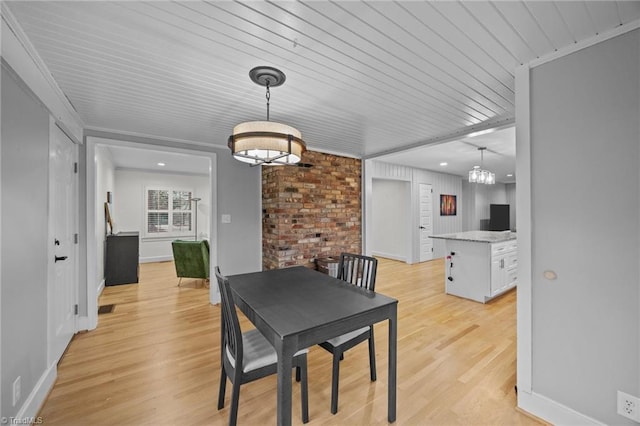 dining room featuring baseboards, wooden ceiling, a notable chandelier, and light wood-style floors