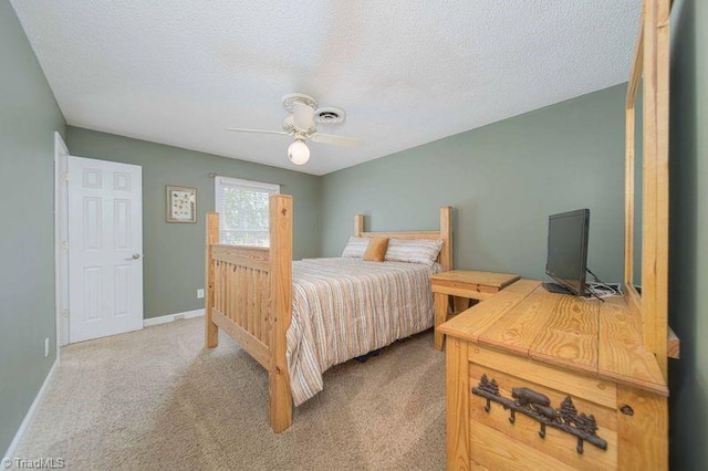 806 Branchwood Dr, Kernersville, NC 27284 - bedroom featuring visible vents, baseboards, ceiling fan, a textured ceiling, and carpet flooring