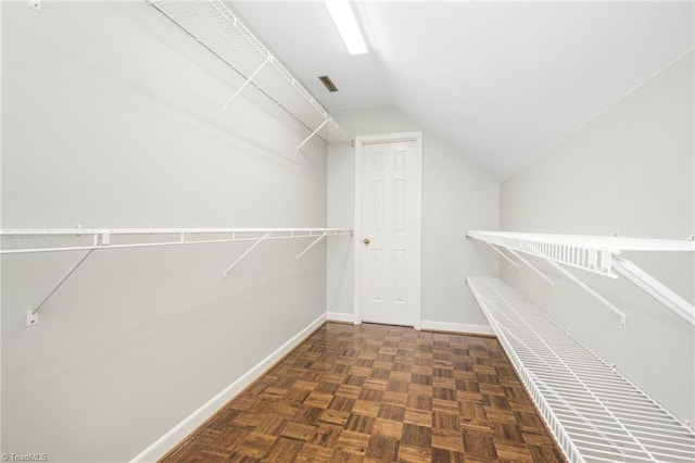 1018 Riverbend Dr, Advance, NC 27006 - walk in closet featuring vaulted ceiling