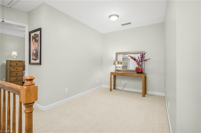 1018 Riverbend Dr, Advance, NC 27006 - hall featuring carpet, attic access, and an upstairs landing