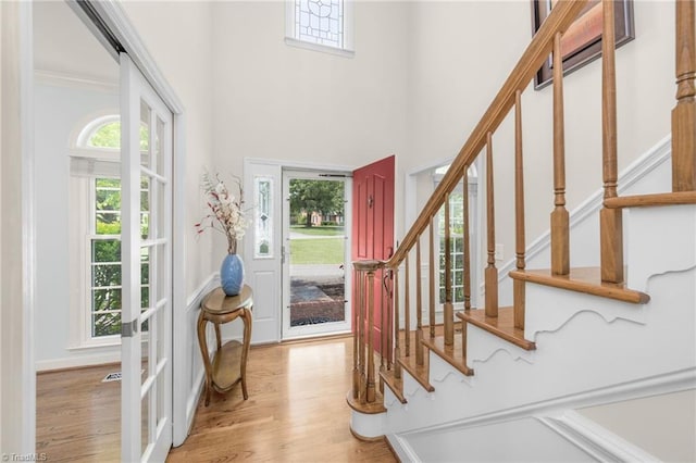 1018 Riverbend Dr, Advance, NC 27006 - entryway featuring light wood-style floors, stairs, and a towering ceiling