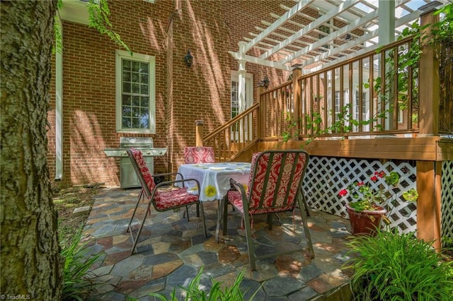 1018 Riverbend Dr, Advance, NC 27006 - view of patio with grilling area, a pergola, and outdoor dining area