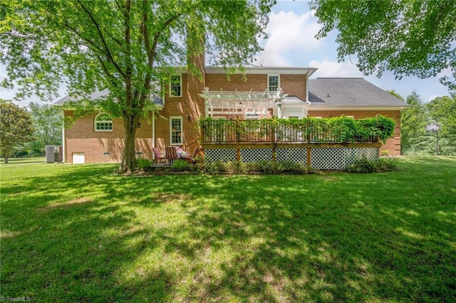 1018 Riverbend Dr, Advance, NC 27006 - rear view of property with a deck, a yard, and brick siding