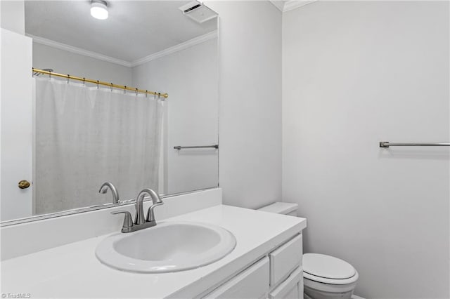 bathroom featuring crown molding, toilet, vanity, and a shower with shower curtain