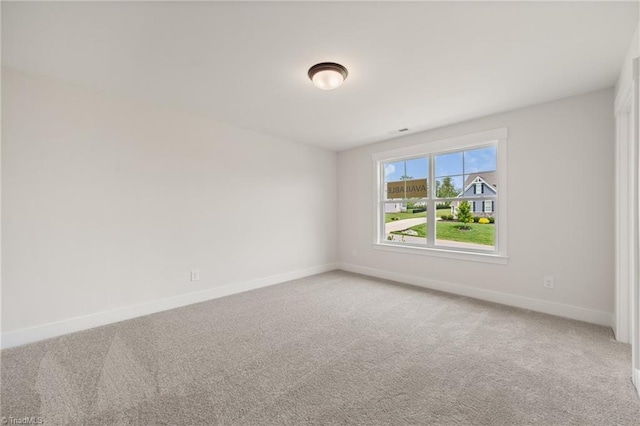 7815 Michaelis St, Greensboro, NC 27455 - empty room featuring baseboards and carpet