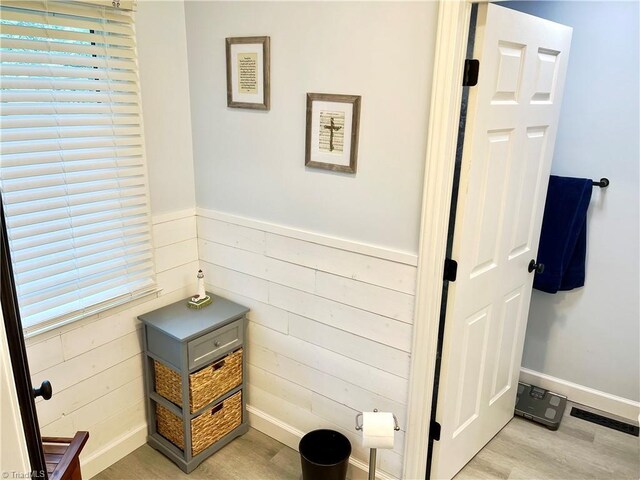 940 Huntington Run Ln, Kernersville, NC 27284 - bathroom featuring wood finished floors and wooden walls
