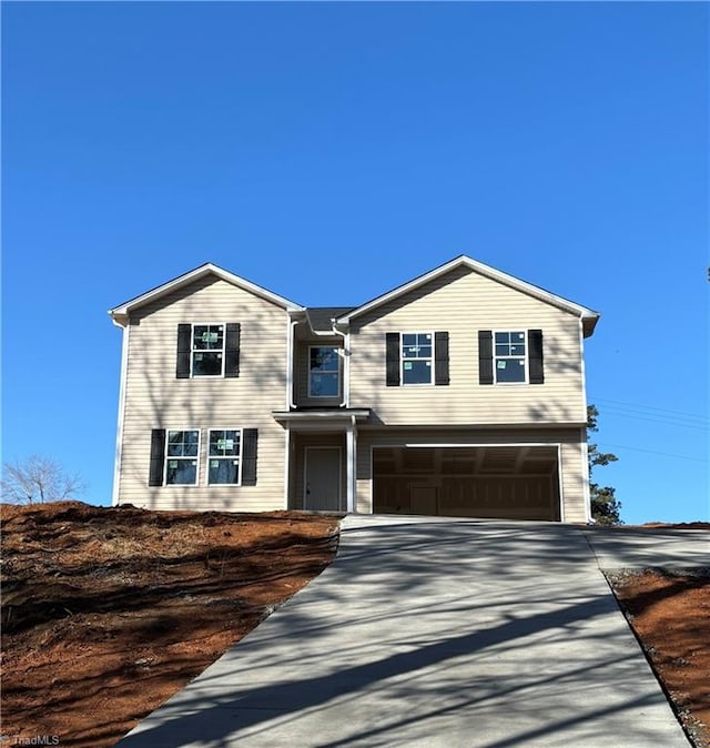 view of front of property featuring a garage