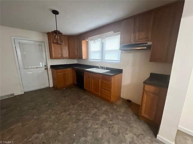 kitchen featuring black dishwasher, sink, and pendant lighting