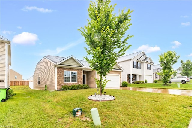1009 Cannonade Dr, Whitsett, NC 27377 - view of front of property featuring an attached garage and driveway