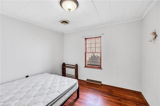 1112 Hamilton St, High Point, NC 27262 - bedroom featuring dark wood-style floors and crown molding