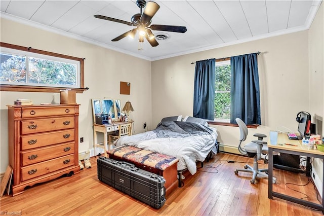 1112 Hamilton St, High Point, NC 27262 - bedroom with light wood finished floors, ornamental molding, a desk, and a ceiling fan