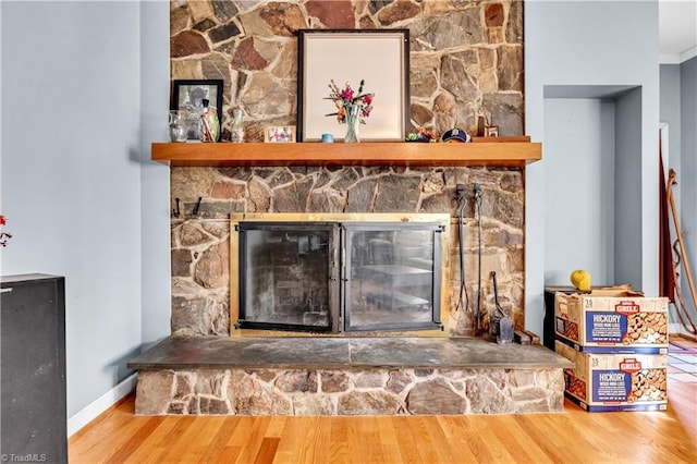 1112 Hamilton St, High Point, NC 27262 - detailed view of a fireplace, wood finished floors, and crown molding