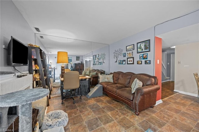217 Village Ln Unit G, Greensboro, NC 27409 - living area featuring stone finish floors