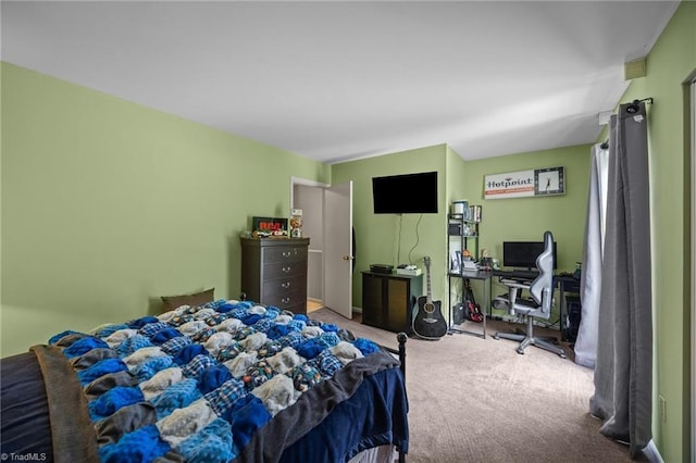 217 Village Ln Unit G, Greensboro, NC 27409 - carpeted bedroom with a desk