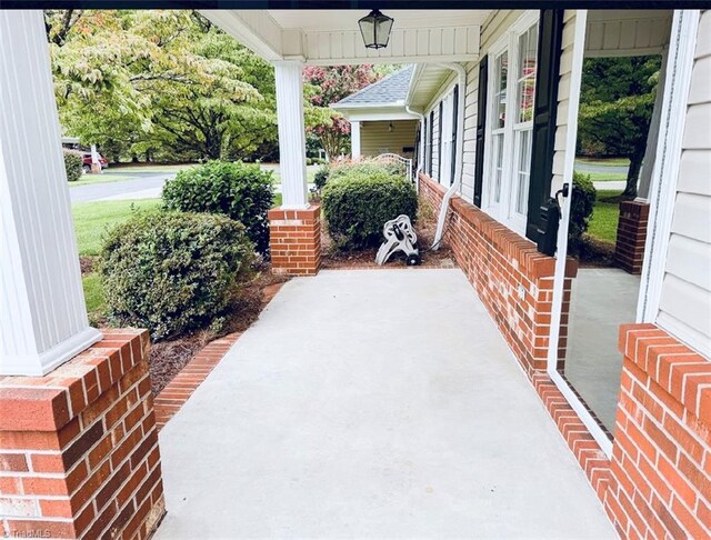 view of patio featuring a porch