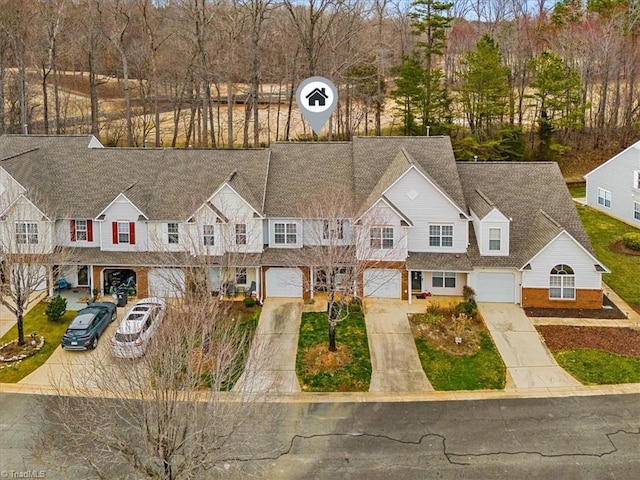 birds eye view of property with a residential view