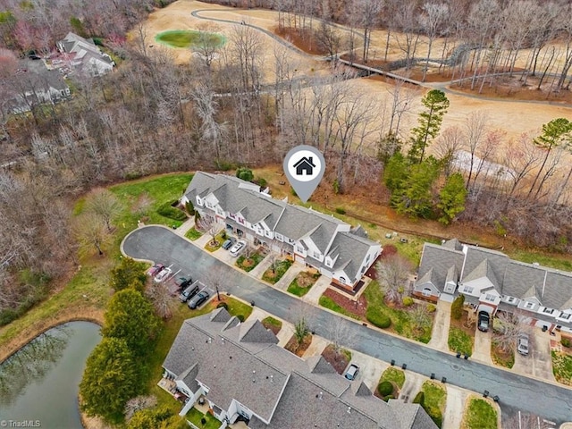 bird's eye view featuring a residential view and a water view