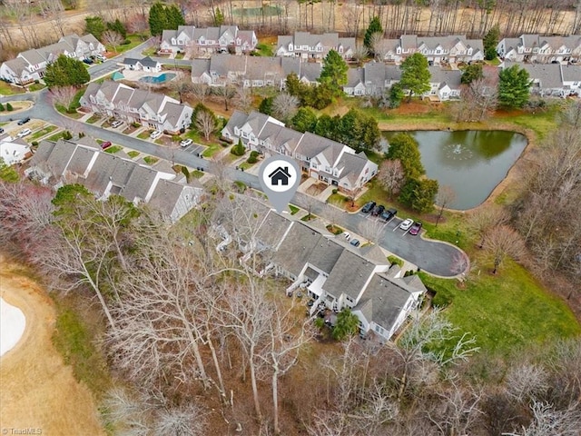 birds eye view of property with a residential view and a water view