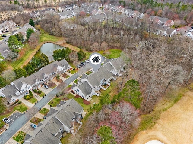 aerial view featuring a water view and a residential view