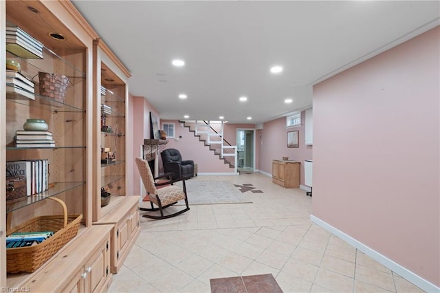 sitting room with light tile patterned floors