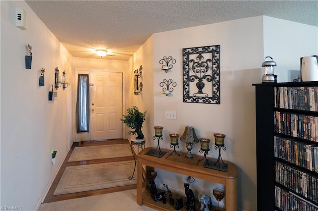 interior space with a textured ceiling