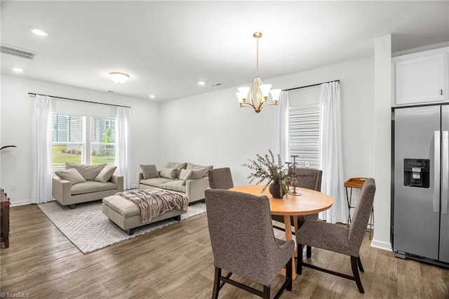 4062 Monteray Cir, High Point, NC 27265 - dining space featuring wood finished floors, a chandelier, recessed lighting, and baseboards