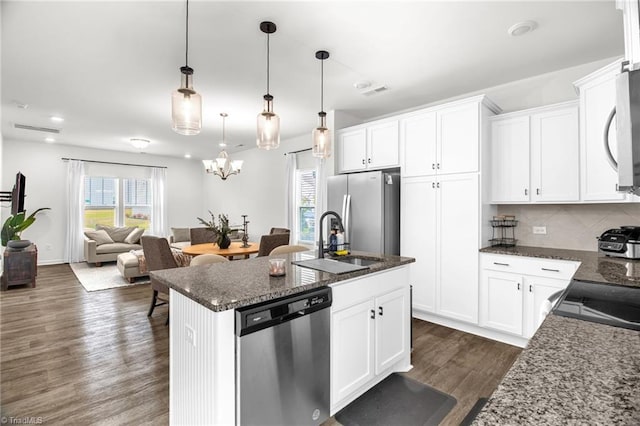 4062 Monteray Cir, High Point, NC 27265 - kitchen with stainless steel appliances, healthy amount of natural light, a sink, dark wood-style flooring, and recessed lighting