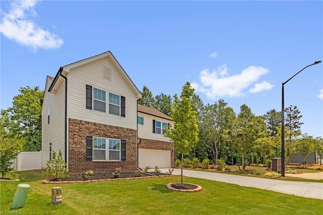 4062 Monteray Cir, High Point, NC 27265 - traditional-style home featuring brick siding, concrete driveway, and a garage