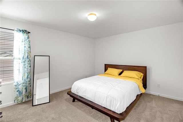 4062 Monteray Cir, High Point, NC 27265 - bedroom featuring light carpet, multiple windows, and baseboards