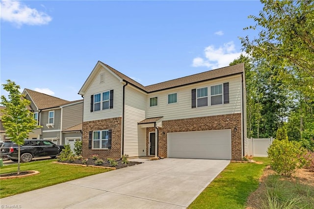 4062 Monteray Cir, High Point, NC 27265 - view of front of home with brick siding, an attached garage, and driveway
