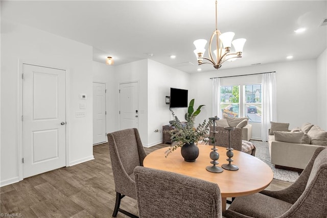 4062 Monteray Cir, High Point, NC 27265 - dining area featuring wood finished floors, a chandelier, recessed lighting, and baseboards