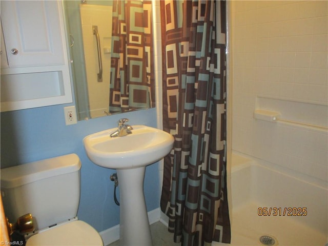 2600 Alamance Church Rd, Greensboro, NC 27406 - bathroom with a shower with shower curtain and toilet