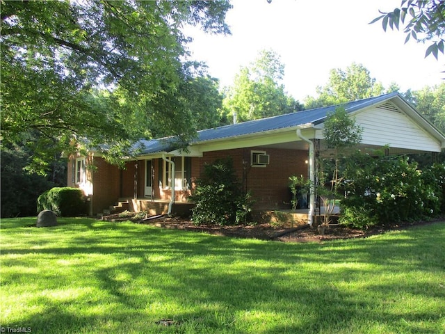 2600 Alamance Church Rd, Greensboro, NC 27406 - view of front of house with a front lawn, a porch, and brick siding