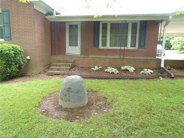 2600 Alamance Church Rd, Greensboro, NC 27406 - view of front facade with a front lawn, brick siding, and entry steps