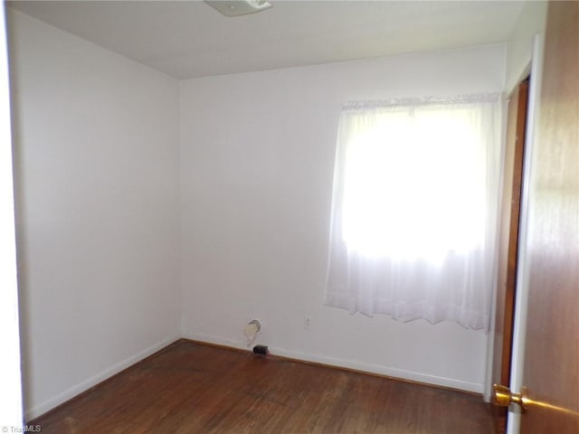 2600 Alamance Church Rd, Greensboro, NC 27406 - empty room featuring wood finished floors and baseboards