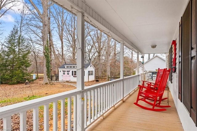 balcony featuring a porch