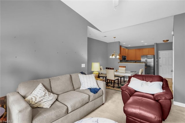 4455 Brassfield Dr Unit 306, Winston-Salem, NC 27105 - living room featuring light carpet, a chandelier, lofted ceiling, recessed lighting, and baseboards