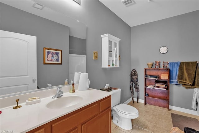4455 Brassfield Dr Unit 306, Winston-Salem, NC 27105 - full bathroom with vanity, toilet, tile patterned flooring, a shower, and baseboards