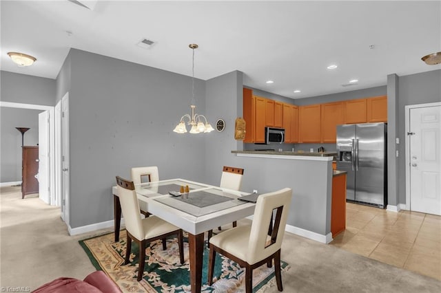 4455 Brassfield Dr Unit 306, Winston-Salem, NC 27105 - dining space with a chandelier, baseboards, light colored carpet, and recessed lighting