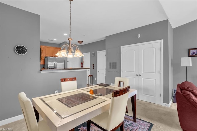 4455 Brassfield Dr Unit 306, Winston-Salem, NC 27105 - dining room with a chandelier, baseboards, recessed lighting, and light carpet