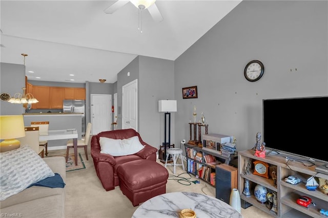 4455 Brassfield Dr Unit 306, Winston-Salem, NC 27105 - living room featuring a ceiling fan, light carpet, a chandelier, and a towering ceiling
