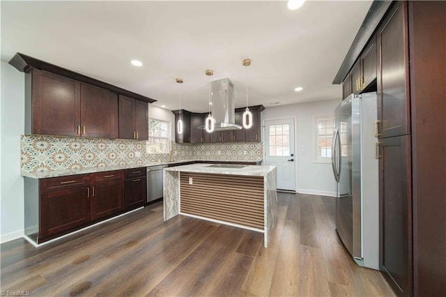 kitchen with a center island, dark wood-type flooring, decorative backsplash, appliances with stainless steel finishes, and island exhaust hood