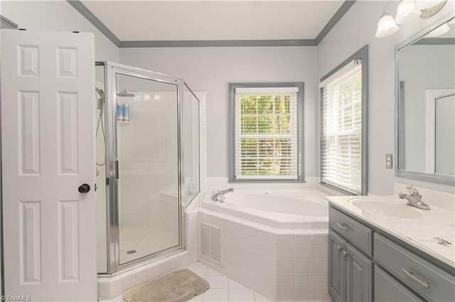 full bath with a garden tub, vanity, ornamental molding, and a stall shower