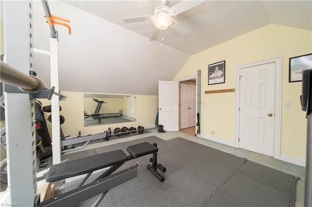 workout area with vaulted ceiling, baseboards, and a ceiling fan