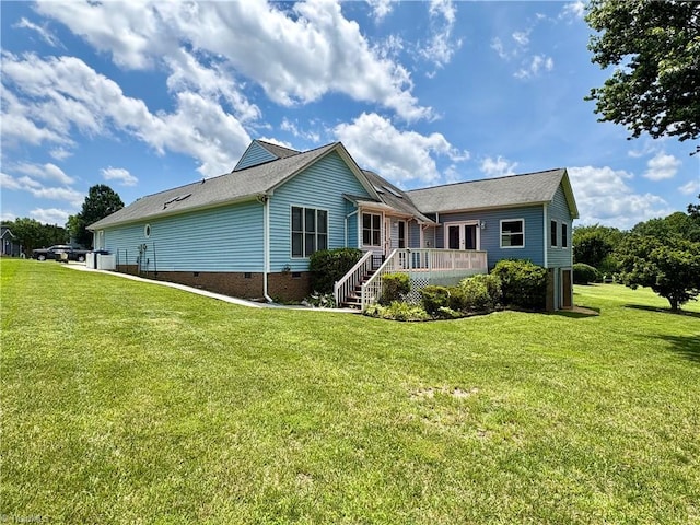 204 Maplewood Ct, Trinity, NC 27370 - view of front facade with crawl space, a front yard, a deck, and roof with shingles